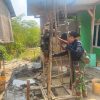 Merangkul Desa,  Satgas TMMD Ke-129 Membangun Sarana Air Bersih, Mengokohkan Persatuan Indonesia